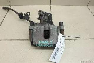  Суппорт тормозной задний левый Mazda 3 BP Арт E95708619, вид 1