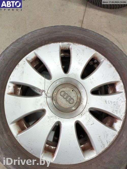 Диск колесный алюминиевый R16 5x112 ET42 к Audi A4 B7 8E0601025AE - Фото 1