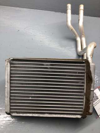 Радиатор отопителя (печки) Ford Fiesta 5 2004г. DD1061A10,2S6H18B539AB - Фото 2