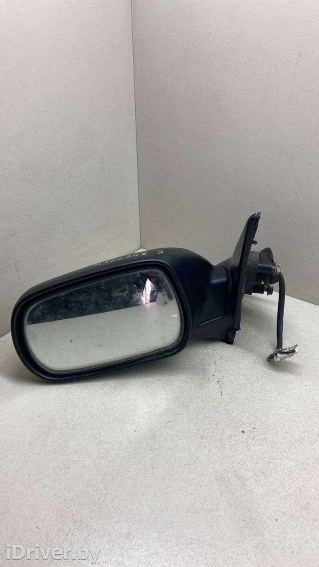 Зеркало наружное левое Nissan Primera 10 1994г.  - Фото 1
