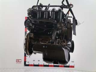 Двигатель  Volkswagen Fox 1.4 i Бензин, 2005г. 030100037AX, BKR  - Фото 4