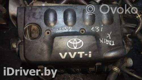 Декоративная крышка двигателя Toyota Yaris 1 2000г. 1121221010, 11212-21010 , artIMP2055340 - Фото 1