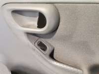 Обшивка двери передней правой (дверная карта) Opel Corsa D 2006г. 13123782 - Фото 3
