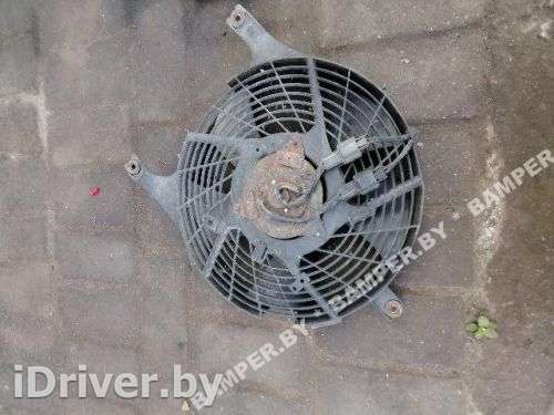 Вентилятор радиатора Mitsubishi Carisma 1998г.  - Фото 1