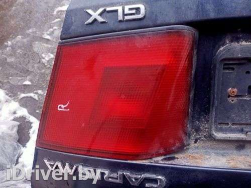 Фонарь крышки багажника правый Mitsubishi Carisma 1997г.  - Фото 1