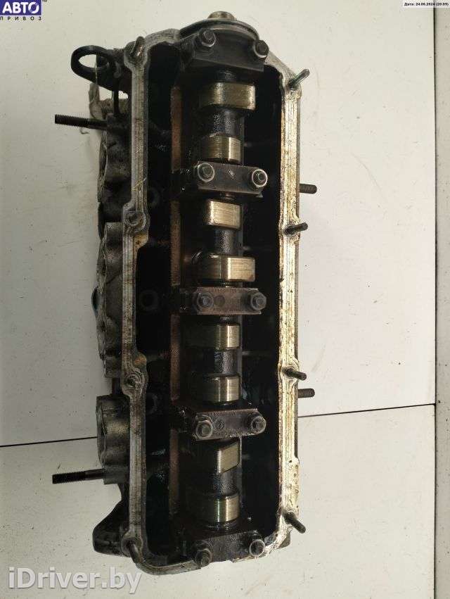 Головка блока цилиндров двигателя (ГБЦ) Volkswagen Passat B5 2001г. 06A103373N - Фото 1