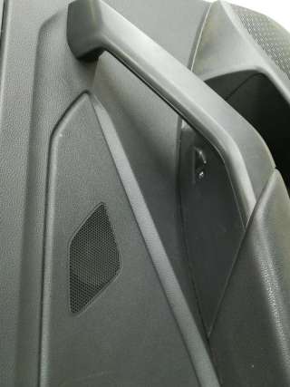 Обшивка двери задней левой (дверная карта) Volkswagen Jetta 7 2019г.  - Фото 2