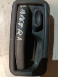 Ручка внутренняя передняя левая Hyundai Lantra 1 1994г. 8261028500 - Фото 2