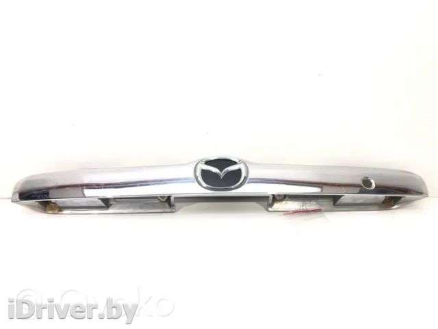 Накладка подсветки номера Mazda Tribute 1 2001г. yl84-78425a22-aaw , artLOS30796 - Фото 1