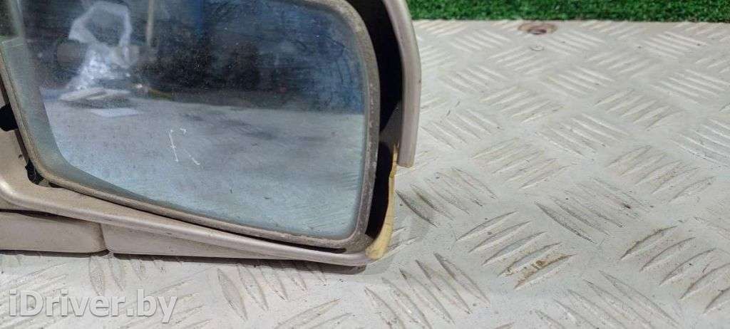 Стекло зеркала наружного правого Toyota Corolla E80 1986г.   - Фото 2