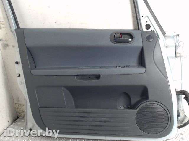 обшивка боковой двери перед лев Mitsubishi Colt 5 2006г.  - Фото 1