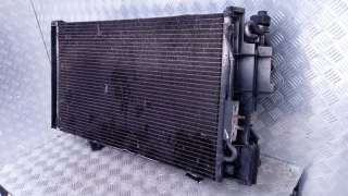 Радиатор кондиционера Chrysler Voyager 4 2003г.  - Фото 2