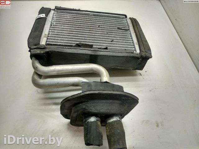 Радиатор отопителя (печки) Ford Mondeo 2 1998г.  - Фото 1