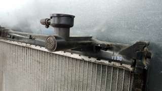 Радиатор системы охлаждения Kia Sorento 1 2009г.  - Фото 10