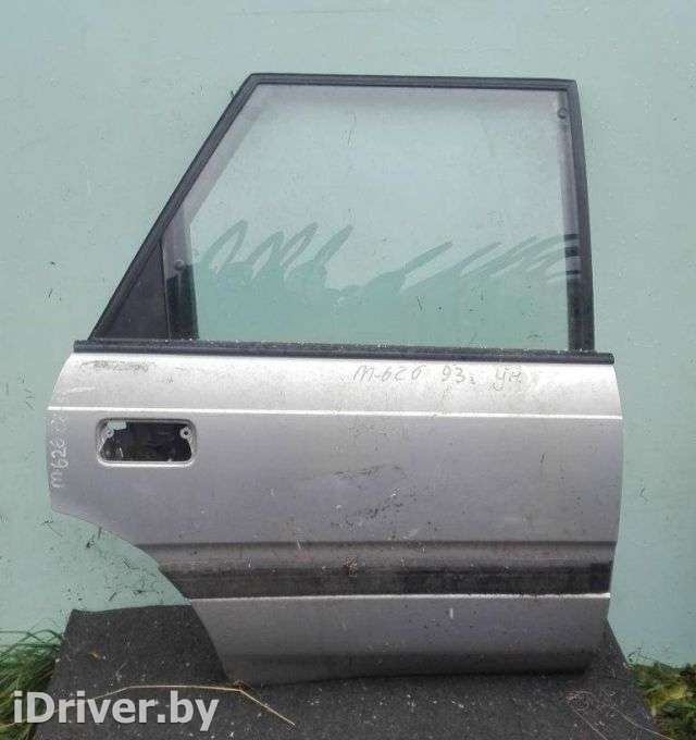 Стекло двери задней правой Mazda 626 GE 1993г.  - Фото 1